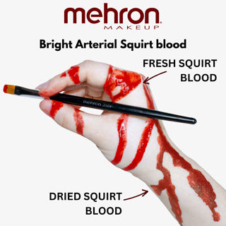 Mehron Bright Arterial Squirt Blood showing fresh red blood and dried blood effects on a hand