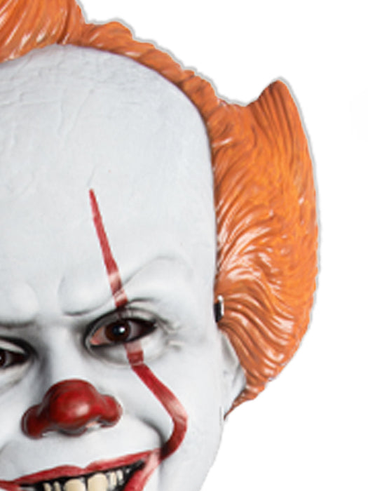 Close-up of Pennywise mask’s painted eye, red facial markings and moulded orange hair