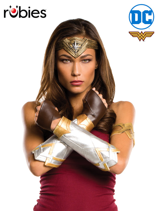 Wonder Woman Accessory Set Adult - model wearing silver and gold gauntlets, faux leather glovelets, gold tiara with star and gold arm band, officially licensed DC Comics product