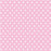 Pink folded gift wrap patterned with rows of white medium dots