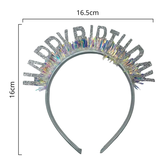 Girl wearing Happy Birthday silver foil headband outdoors