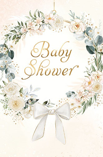 Baby Shower card with gold-coloured script inside a pale floral and green foliage wreath, finished with a white bow on a cream background