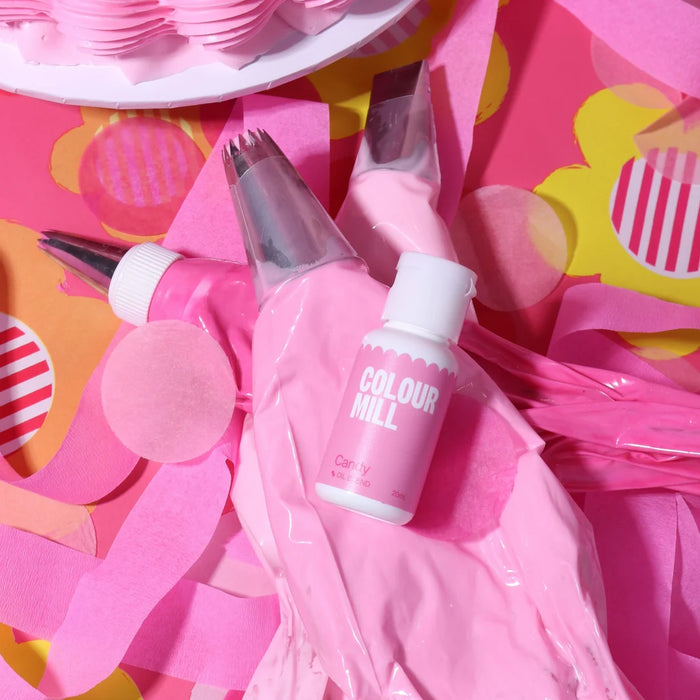 Colour Mill Candy Oil Blend bottle on pink icing piping bags