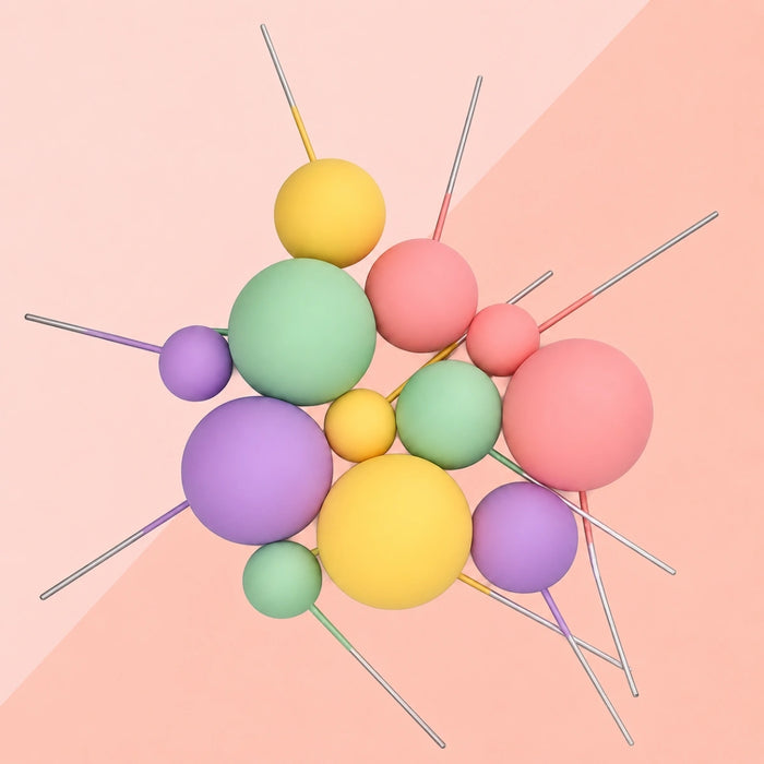 Pastel Bloom matte ball cake toppers in mint green, pink, purple and yellow on wires