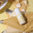 Colour Mill Sand bottle on beige icing piping bags