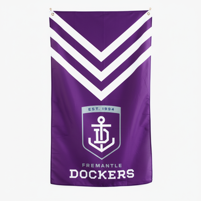 Large purple Fremantle Dockers AFL supporter flag with white chevrons, club logo and hanging eyelets